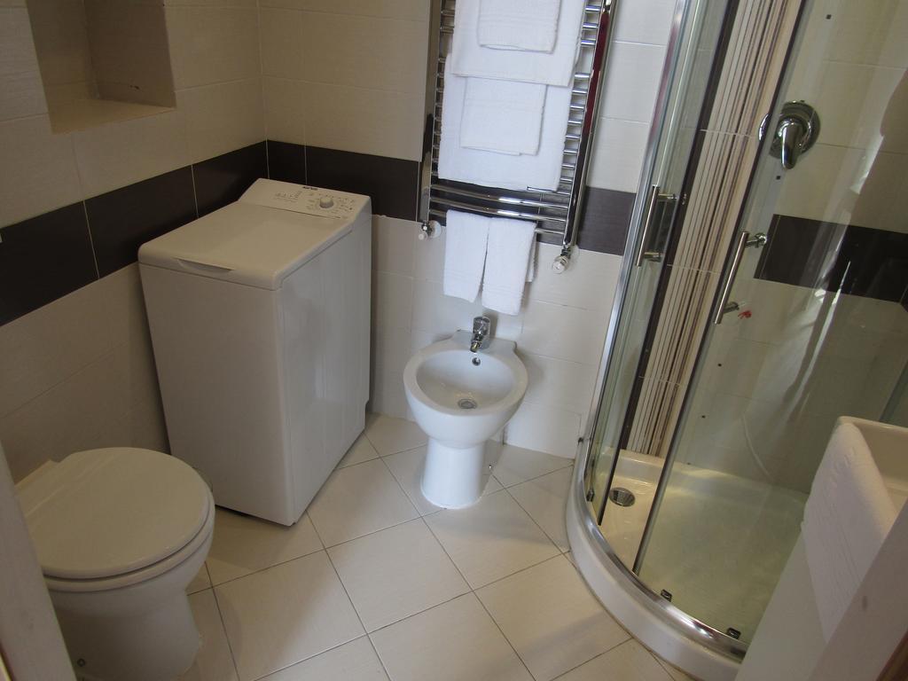 Chambre Lit Queen-Size avec Accès Exclusif au Spa - Vue sur Jardin